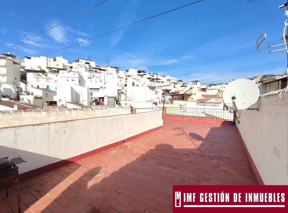 Foto 1 de Casa en venda a calle De Velez de 4 habitacions amb terrassa i aire acondicionat