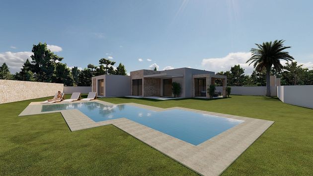 Foto 1 de Venta de casa nueva en calle Del Camí Vell de la Fustera de 3 habitaciones con piscina y jardín