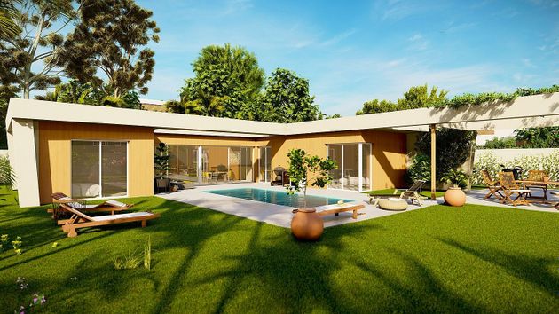 Foto 2 de Casa nova en venda a calle Anhidrita de 4 habitacions amb piscina i jardí