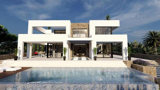 Foto 1 de Casa nova en venda a Benissa de 4 habitacions amb piscina i jardí