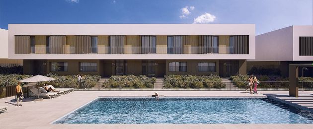 Foto 1 de Casa nova en venda a calle Quiñones de 4 habitacions amb piscina i jardí