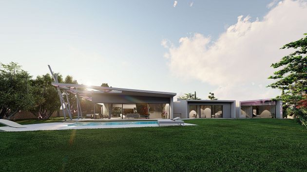 Foto 1 de Casa nova en venda a calle Valle de Tobalina de 5 habitacions amb piscina i jardí
