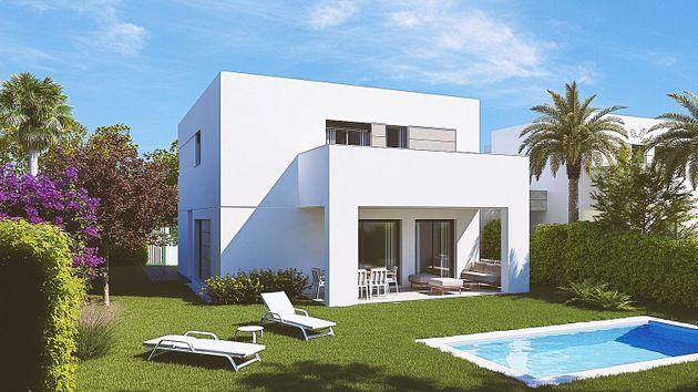 Foto 2 de Casa nova en venda a calle Guadalaviar de 4 habitacions amb jardí i aire acondicionat