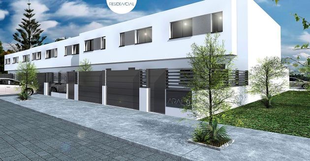 Foto 1 de Casa nova en venda a calle Cortes Valencianas de 3 habitacions amb jardí
