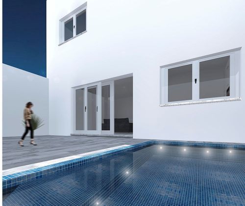 Foto 1 de Casa nova en venda a calle Cortes Valencianas de 3 habitacions amb jardí