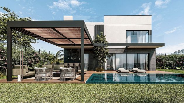 Foto 2 de Venta de casa nueva en calle Pintor Virgilio Galán de 4 habitaciones con piscina y jardín
