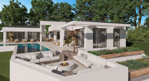 Foto 1 de Casa nova en venda a urbanización Andalucía F de 4 habitacions amb piscina i jardí