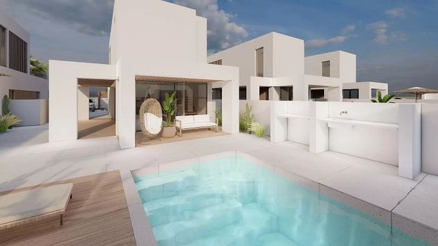 Foto 2 de Casa nova en venda a calle Tres Islas de 3 habitacions amb piscina i jardí