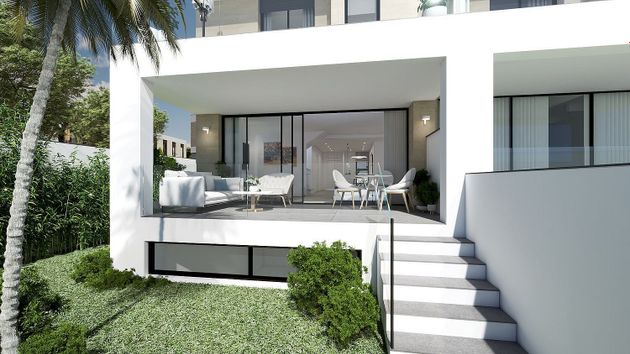 Foto 1 de Casa nova en venda a calle Adelfas de 3 habitacions amb piscina i jardí