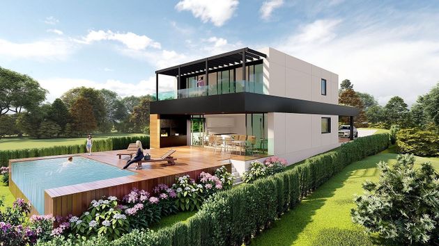 Foto 2 de Casa nova en venda a calle As Torres de 4 habitacions amb jardí
