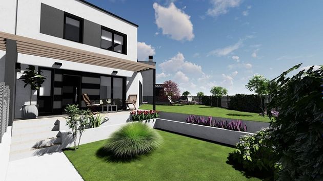 Foto 2 de Casa nova en venda a calle De la Nube de Magallanes de 4 habitacions amb jardí