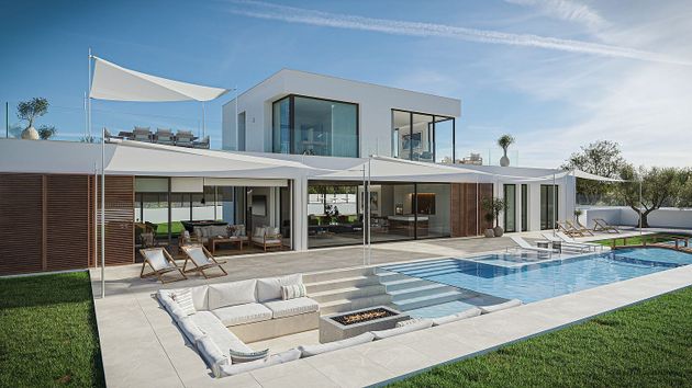Foto 2 de Casa nova en venda a calle Son Guala de 3 habitacions amb piscina i jardí