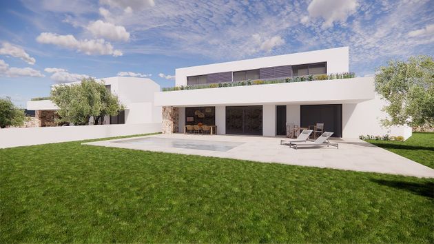 Foto 2 de Casa nova en venda a calle De Sa Caleta de 4 habitacions amb piscina i jardí