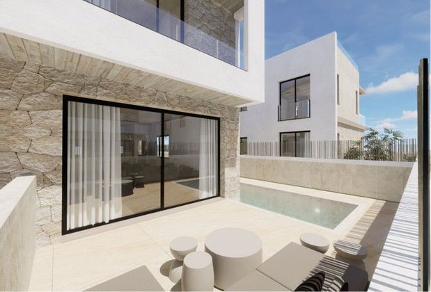 Foto 1 de Casa nova en venda a calle Puig Den Valls de 3 habitacions amb piscina i jardí