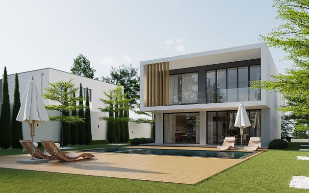 Foto 1 de Casa nova en venda a calle Salcillo de 4 habitacions amb piscina i jardí