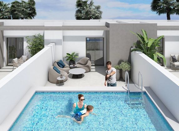 Foto 2 de Casa nova en venda a calle José Sánchez Parrado de 3 habitacions amb jardí i aire acondicionat