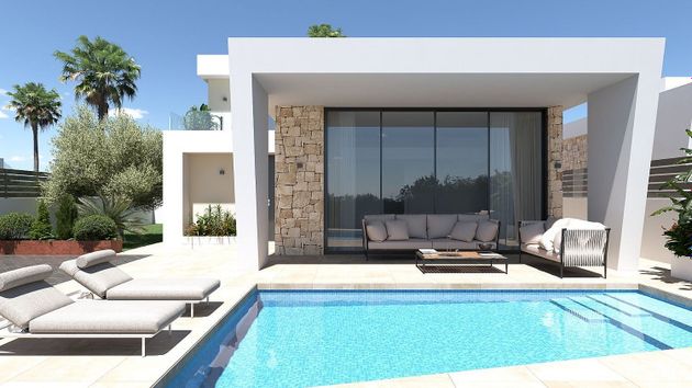 Foto 2 de Venta de casa nueva en calle Borges de 3 habitaciones con piscina y jardín