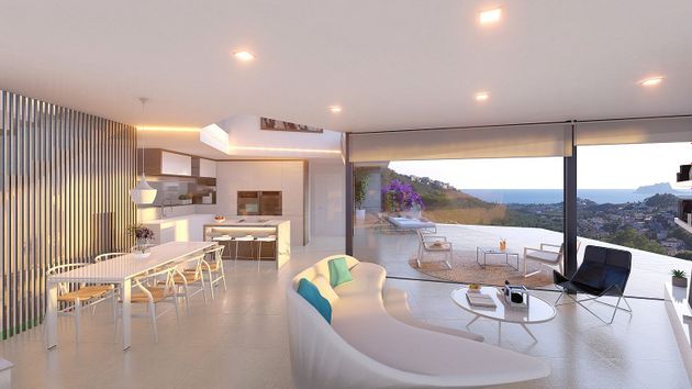 Foto 1 de Casa nova en venda a urbanización Valle del Portet de 4 habitacions amb piscina i jardí