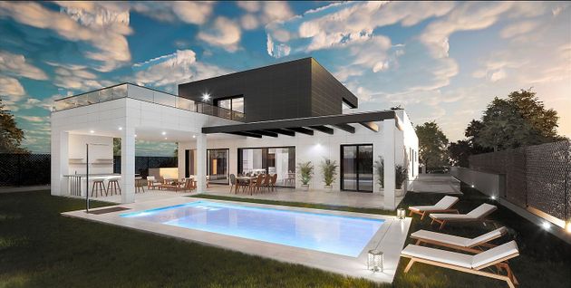 Foto 2 de Casa nova en venda a calle Perseo de 4 habitacions amb piscina i jardí