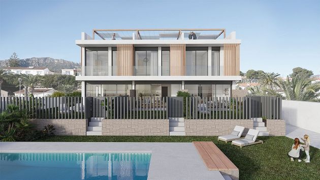 Foto 1 de Casa nova en venda a calle De Caladoques de 3 habitacions amb piscina i jardí