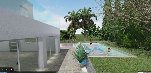 Foto 1 de Casa nova en venda a calle Josep Ribas de 4 habitacions amb piscina i jardí