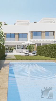 Foto 1 de Casa nova en venda a urbanización Jardin Botanico de 4 habitacions amb piscina i jardí
