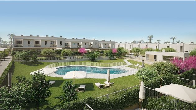 Foto 1 de Casa nova en venda a calle Manuel Piñero de 3 habitacions amb piscina i jardí