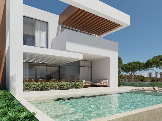 Foto 2 de Casa nova en venda a calle Joviano de 5 habitacions amb piscina i jardí