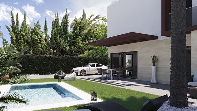 Foto 2 de Casa nova en venda a calle Holanda de 4 habitacions amb jardí i aire acondicionat