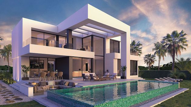 Foto 1 de Casa nova en venda a calle Cónsul Porfirio Smerdou de 4 habitacions amb piscina i jardí