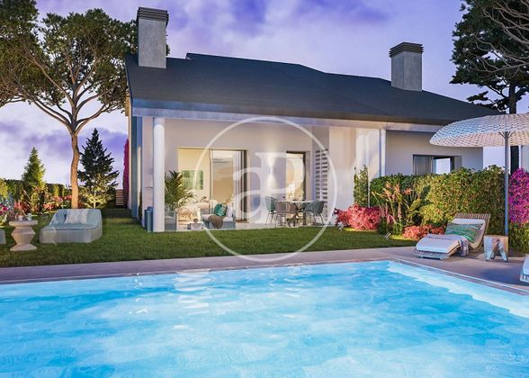 Foto 2 de Casa nova en venda a calle Almendro de 4 habitacions amb piscina i jardí