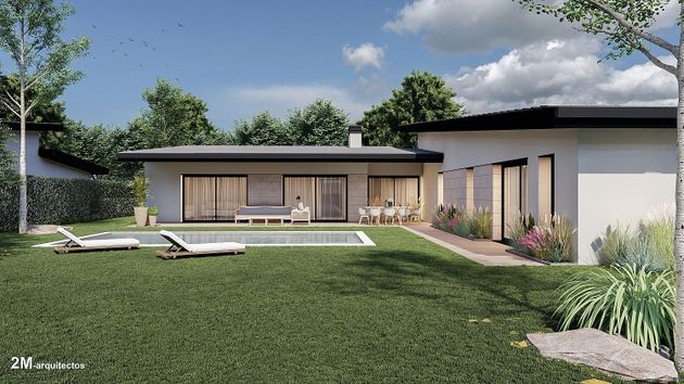 Foto 1 de Casa nova en venda a calle Miraflores de la Sierra de 4 habitacions amb piscina i jardí