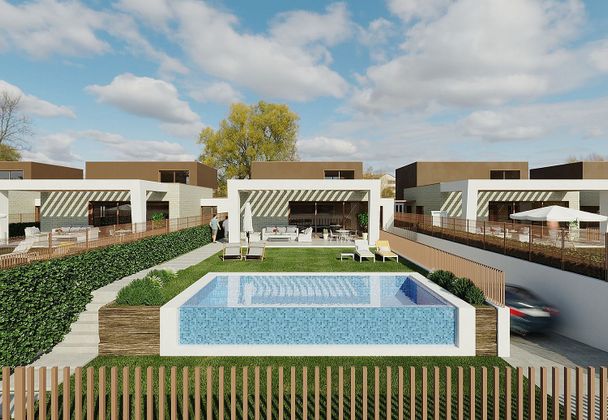 Foto 2 de Venta de casa nueva en calle Miguel Hernández de 3 habitaciones con piscina y jardín