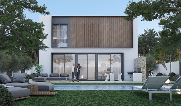 Foto 2 de Casa nova en venda a calle Mar Balear de 4 habitacions amb piscina i jardí