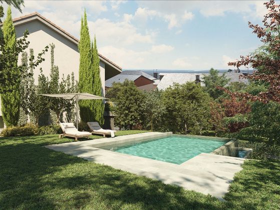 Foto 1 de Casa nova en venda a calle Residencia de 4 habitacions amb jardí i aire acondicionat