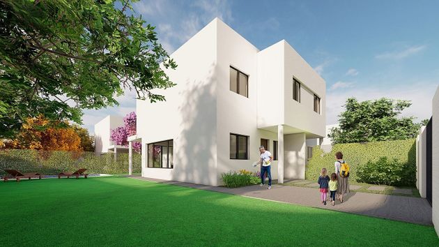Foto 1 de Casa nova en venda a calle Curro Romero de 3 habitacions amb jardí