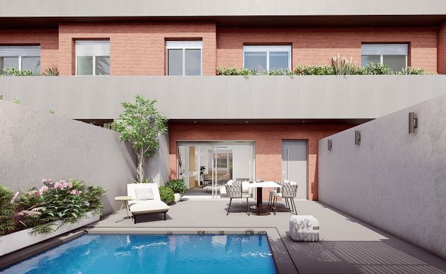 Foto 1 de Casa nova en venda a calle Zenobia de Camprubi de 6 habitacions amb jardí i aire acondicionat