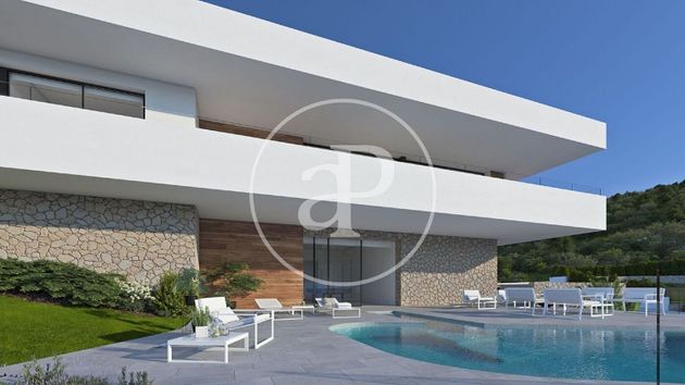 Foto 1 de Venta de casa nueva en urbanización Cumbre del Sol Benitachell de 3 habitaciones con piscina y jardín