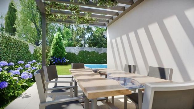 Foto 1 de Casa nova en venda a calle Cantueso de 4 habitacions amb jardí i aire acondicionat