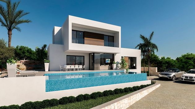 Foto 2 de Casa nova en venda a calle Riu Xuquer de 3 habitacions amb piscina i jardí