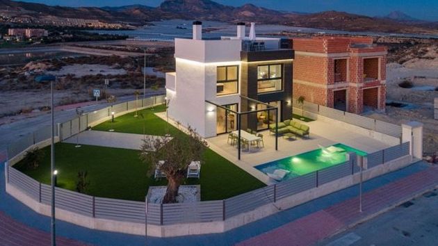 Foto 1 de Casa nova en venda a calle Partida Cotoveta de 3 habitacions amb piscina i jardí