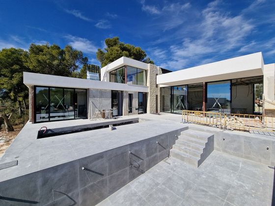 Foto 1 de Venta de casa nueva en Moravit - Cap Blanc de 4 habitaciones con piscina y jardín