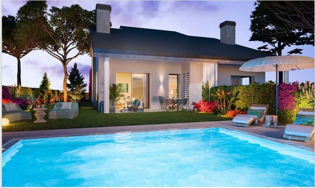 Foto 1 de Casa nova en venda a Parquelagos - Puente Nuevo de 3 habitacions amb piscina i jardí
