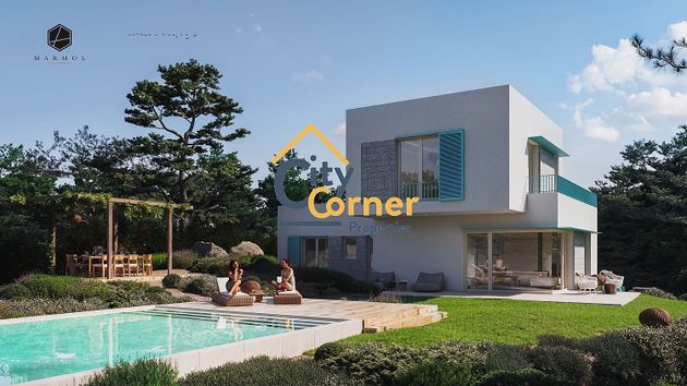 Foto 1 de Casa nova en venda a calle Caravaca de 5 habitacions amb piscina i jardí
