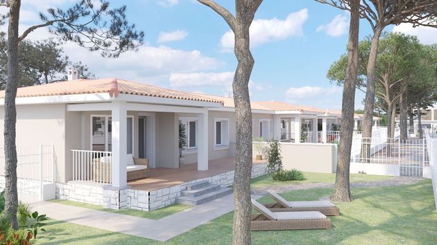 Foto 1 de Casa nova en venda a calle Playa Romana de 3 habitacions amb jardí i aire acondicionat
