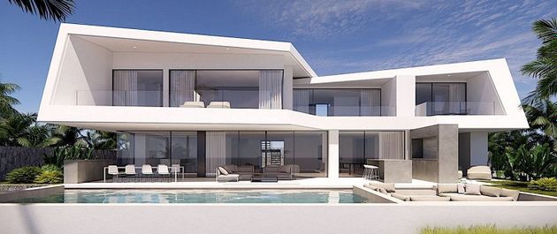 Foto 2 de Casa nova en venda a calle Francia de 4 habitacions amb piscina i jardí