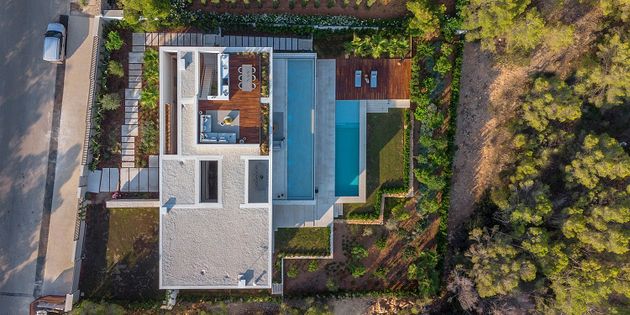 Foto 2 de Casa nova en venda a calle Badía de Palma de 5 habitacions amb piscina i jardí