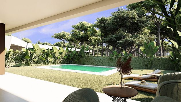 Foto 2 de Casa nova en venda a calle Monte Perdido de 3 habitacions amb jardí