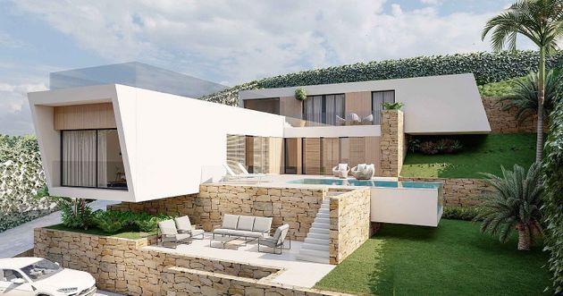 Foto 1 de Casa nova en venda a calle De Francia de 4 habitacions amb piscina i jardí