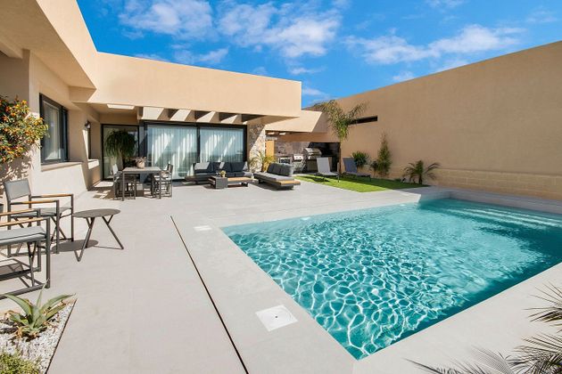 Foto 2 de Casa nueva en venta en calle Aruba Altaona Country & Living Resort de 2 habitaciones con piscina y jardín